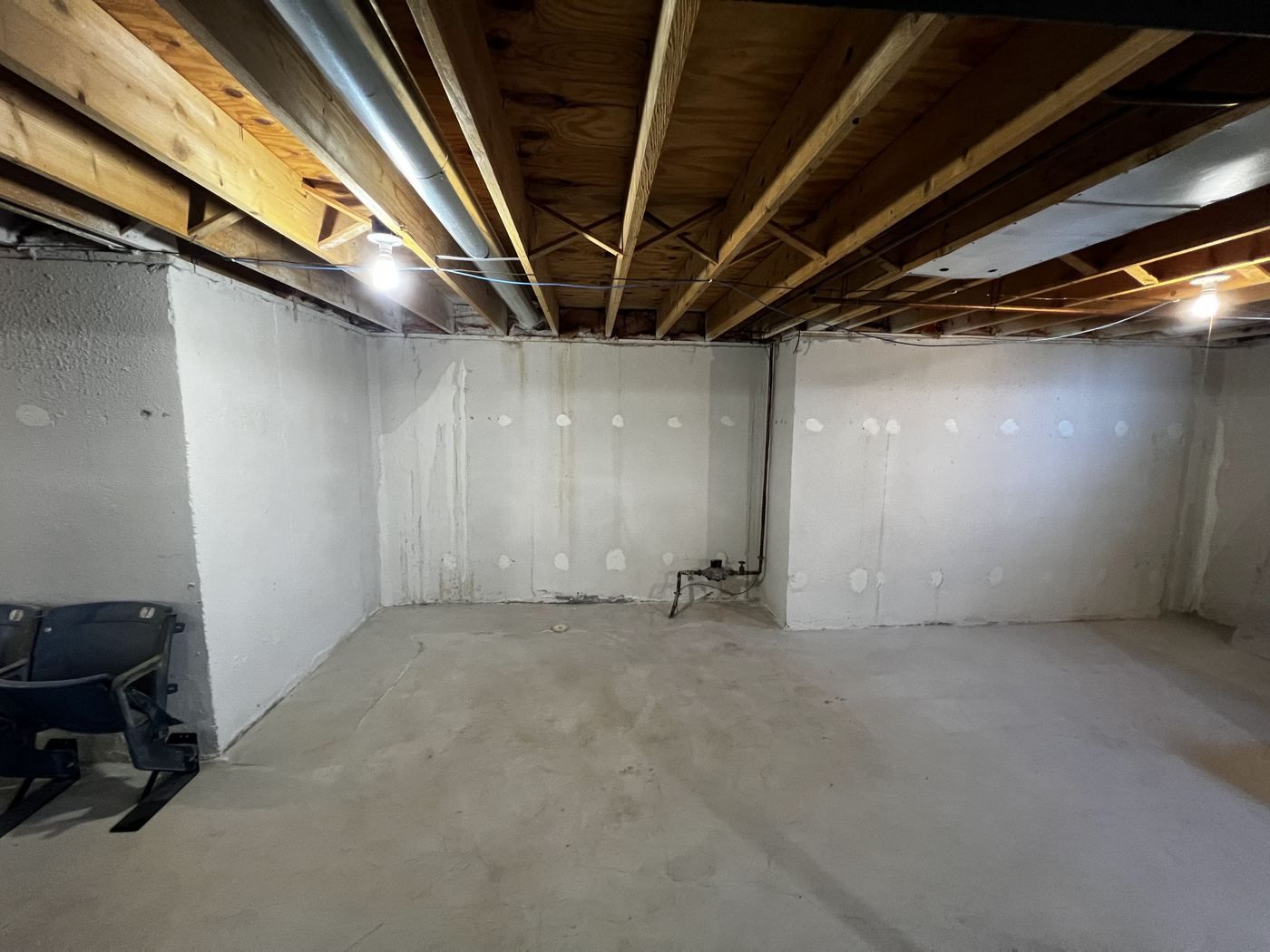 Before: Fireplace & TV wall before, Macomb